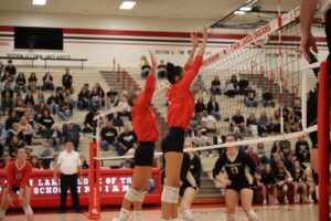 Two Hornets prepare for a block, photo provided by Jennifer Allinder Stingley
